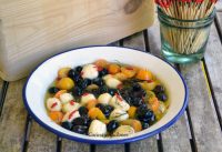 aliño de aceitunas empeltre de Aragón con mucho sabor, lleva mozarella y naranjas chinas